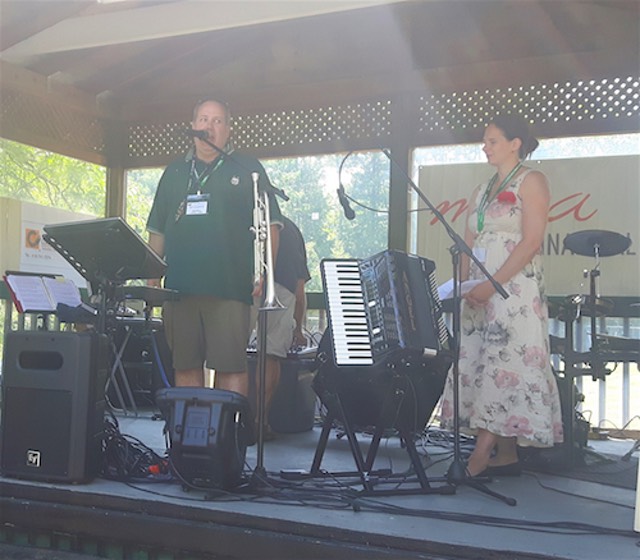 President Bill Kocjancic and Announcer Sarah Larsen
